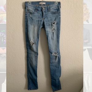 Distressed low rise light lash jeans